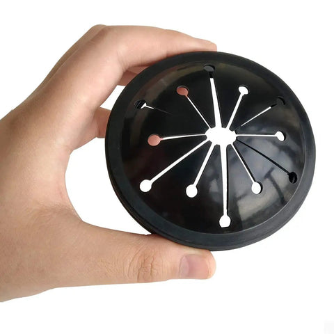 Person holding black Three Pack Garbage Disposal Splash Guards 3 Point 1 Inch Sink Baffles Replacement For Whirlaway Waste King And GE Models