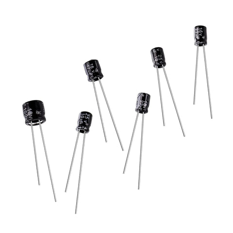 Six Piece Capacitor Repair Set For Bose Wave CD Player with various capacitor sizes and ratings for audio repair.
