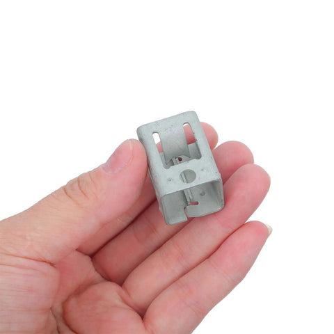 Rock Solid 10 Pack Solar Panel Clip Brackets Spring Steel Fasteners For Roof Mounting System held in hand, showing silver metal clamp detail.