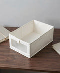 Three Pack Clothes Storage Bins With Clear Window Handles And Multi Purpose Fabric Organizers For Closet Linen Pants Books Home Room Makeover Straight Up Game Changer To Keep Your House Tight With Zero Stress Vibes And Smooth Daily Operation, beige bin on table with clear front window.