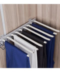 Expandable Steel Pants Rack Designed To Keep Your Duds Neatly Organized, showcasing nine pants on flocked arms for smooth glide storage.