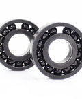Kickass Heat Resistant Bearings 12X28X8Mm 500C Double Sealed Steel Balls, robust black steel bearings for heavy machinery use.