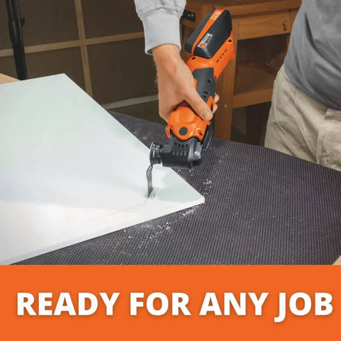Kickass Multi Tool Oscillating Blade Featuring Hella Smooth Starlock Mount slicing through drywall on a workbench.