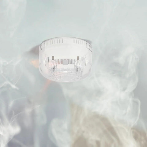 Professional Fire Alarm Detector Removal Head Replacement Attachment For No Hassle Installs and Swift Detector Swaps With Slick Anti Slip Grip and Built Like A Tank Durability For Field Pros in use with smoke.
