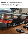 3D Printer Bed Leveling Kit with aluminum hand twist nuts and silicone bed spacers installed on printer for easy calibration.