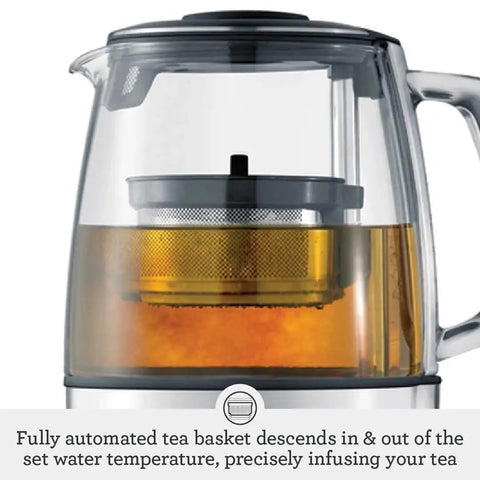 Close-up of Tea Maker Infuser And Water Kettle 51 Oz Capacity With Programmable One Touch Controls And Auto Tea Basket, showing infusion process in brushed stainless steel and glass.