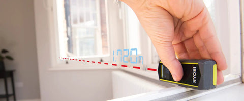 Pro 20 Meter Laser Distance Meter With Clear Digital Screen And Continuous Measurement Mode in use measuring 1.72m indoors.