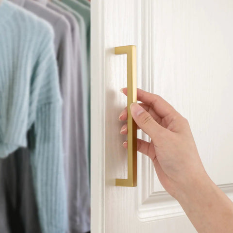 Top Shelf 10 Pack Brushed Gold Cabinet Pulls 5 Inch Square Bar Drawer Handles on cabinet door, solid metal hardware in use.