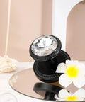 Gold Interior Privacy Glass Door Knob With Lock For Bedroom And Bathroom, black base, crystal knob, on mirrored surface with flower accent