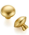 Rock Solid Zinc Alloy Cabinet Pulls Featuring A Slick Brushed Gold Finish 1 1/4 Inch Diameter heavy duty knobs shown from an angle.
