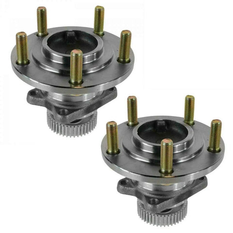 Heavy Duty Four Piece Wheel Hub And Bearing Assembly Kit Built Sweet For Your Everyday Rig, dual metal wheel hubs with gold bolts.
