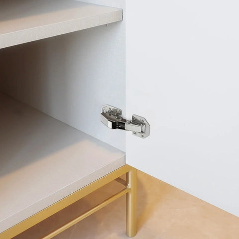 Slick Concealed Cabinet Hinges Featuring Heavy Duty Soft Close Mechanism in brushed nickel on cupboard door.