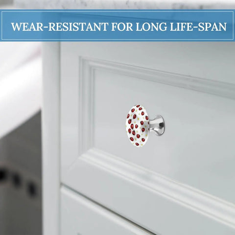 Rock Solid Set Of 2 Round Cabinet Knobs 1.1 Inch, Built Tough Stainless Steel Drawer Handles With Screws, red ladybug knob on white drawer.