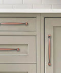 Rock Solid Brushed Antique Copper Cabinet Pulls Two Pack Three Inch Center To Center Vintage Drawer Handles For Kitchen Cupboards And Dressers Hella Durable Grip on light gray kitchen cabinets.