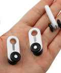 Dead Silent Double Wheel Curtain Track Rollers 30 Pack With Smooth Gliding Pulleys held in a hand, showcasing design and material.