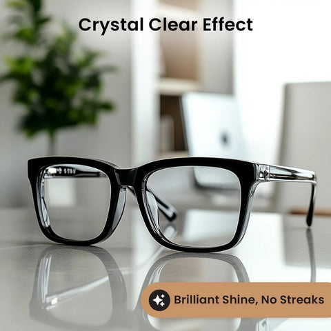 Eyeglasses in a black plastic frame, front view on a glossy reflective surface.
