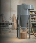 Heavy Duty Industrial Dust Collector System For Metal Powder Removal In Workshops And Commercial Shops With Weatherproof Gray Housing standing in a workshop.