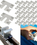 Heavy Duty Steel Solar Panel Grounding Clips 50 Pack For Roof And Ground Mount PV Systems arranged on a surface with a hand demonstrating use.