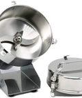 Electric Grain Grinder Mill With Swing Open Chamber showcasing stainless steel blades and lid, ideal for home kitchen use.