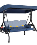 Blue three seat outdoor porch swing with adjustable canopy and stand, featuring removable cushions and cup holder for backyard hangout