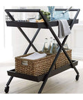 Killer Three Tier Bar Serving Trolley With Rust Free Steel Build And Smooth Tempered Glass Top Heavy Duty Kitchen Storage Cart and Salon Display Stand Built Solid To Handle The Daily Grind in a modern kitchen with drinks.