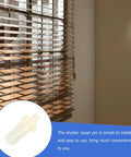 Close-up of a plantation shutter with a white spring-loaded pin, showcasing the 40 Piece Plantation Shutter Repair Pins Set With Spring Loaded Plastic Hardware For Cabinet And Furniture Fixes Quick Snap Sturdy Build Sweet Value Zero Hassle Installation Your Absolute Weekend Project Winner.