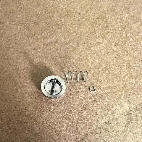 Premium Metal Shutter Replacement Button For Compact Cameras Featuring Smooth Snap Action and a Dead Simple Drop In Install Process.