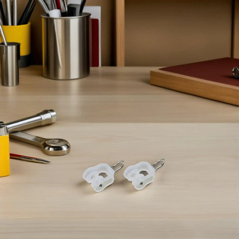 Smooth Operation Curtain Track Pulley Set Featuring Rock Solid Plastic Double Wheel Rollers For Seamless Sliding On Straight Or Curved Tracks Zero Hassle Easy DIY Fix - white plastic gliders on wooden desk.