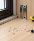 M6 Spring Lock Washers Heavy Duty Stainless Steel 300 Piece Pack on a wooden surface next to a screwdriver.