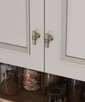 10 Pack Brushed Nickel Cabinet Knobs and Silver Gold Knobs on kitchen cabinet doors, modern hardware with durable zinc alloy construction.