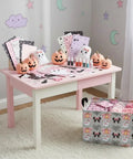 Dope Boo Halloween Basket For Kids With Pink Bow Glowing Ghost Canvas Trick Or Treat Tote with craft supplies on table.