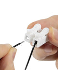 Plug And Play VCM Disable Harness For Honda 3.5L V6 Engines showing white connectors with black wires during installation.