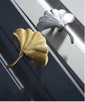 Slick Brass Cabinet Handle With Fresh Modern Nordic Vibe Sturdy Electroplated Furniture Knobs For Drawers Doors sleek leaf design