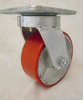 Rock Solid 5X2 Inch Polyurethane On Steel Caster Kit With Two Swivel And Two Rigid Red Wheels showing a swivel caster with a red polyurethane wheel.
