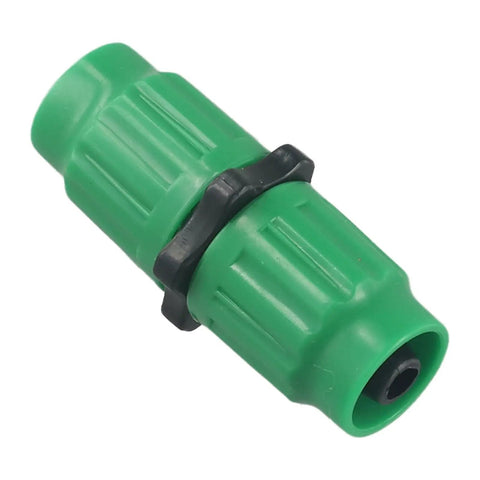 Green quick connect fitting part of Expandable Garden Hose Repair Kit For 5/8 And 3/4 Inch Lines Quick Connect Fittings compatible with tubes.