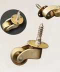 Solid Polished Brass Swivel Casters Set Of Four Vintage Antique Furniture Wheels Double Bearing Heavy Duty setup showing top and side views.