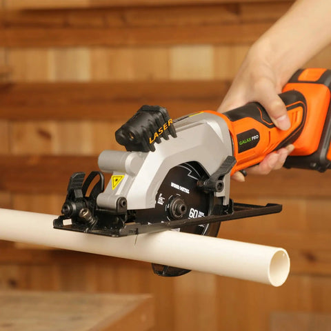 Compact Cordless Mini Circular Saw 20V Battery Powered With Blazing 3400 RPM Motor cutting PVC pipe with laser guide.