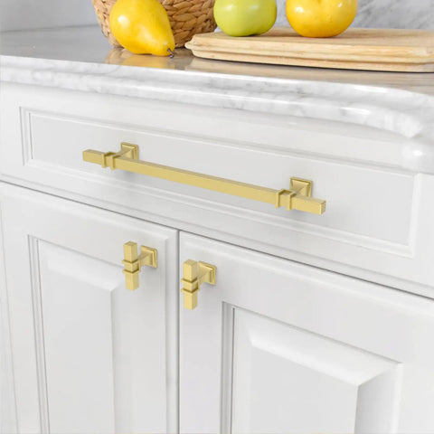 Boss Level 10 Inch Brushed Gold Kitchen Cabinet Handles 10 Pack on white cabinets with countertop, modern design.