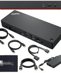 Badass Thunderbolt 4 Docking Station Bundle With Strong 300W Adapter and connection cables on a flat surface with microfiber rag.