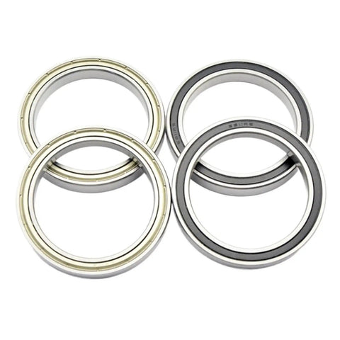 High Precision Stainless Steel Deep Groove Ball Bearings With Sealed Shielding And Industrial Grade Heavy Duty Build For Smooth Spinning Action And Rock Solid Longevity On Every Tough Job - four stainless steel ball bearings with sealed shielding.