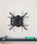 Built Tough Full Motion TV Wall Mount With Effortless Swivel And Tilt Angles For Twenty Six To Fifty Five Inch Screens Handling Up To Eighty Pounds mounted on a wall for easy installation.