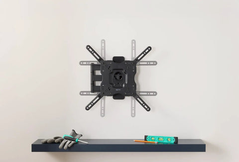 Built Tough Full Motion TV Wall Mount With Effortless Swivel And Tilt Angles For Twenty Six To Fifty Five Inch Screens Handling Up To Eighty Pounds mounted on a wall for easy installation.