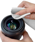 Xthel white microfiber glasses cleaning cloth, 7x6 inches, used to wipe a camera lens