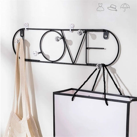Straight Up Versatile Wall Mounted Coat Rack With Smooth Gold Metal Hooks That Really Is A Whole Game Changer For Your Entryway Closets Bathrooms And Garages To Keep Everyday Gear Completely Sorted Today with black wire design and hooks.