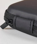 Close-up of the heavy-duty zipper on the Slick Squared Eva Hard Shell Organizer Pouch For Earbuds Charging Cables Keys And Coins.