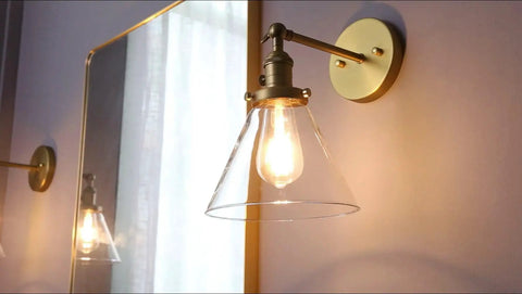 1 Light Wall Mount Sconce with Funnel Flared Clear Glass Shade in a retro-industrial style, antique gold finish