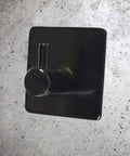 Rock Solid Black Stainless Steel Adhesive Wall Hook For Coats Towels And Umbrellas With No Hassle Peel Stick Mount showing sleek design.