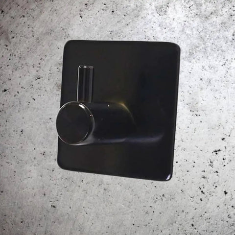 Rock Solid Black Stainless Steel Adhesive Wall Hook For Coats Towels And Umbrellas With No Hassle Peel Stick Mount showing sleek design.