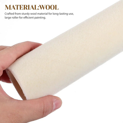 Close-up of a hand holding a 4mm nap wool roller cover, a part of 6 Piece Wool Paint Roller Covers With 4mm Nap, Compact Wall Painting Supplies.