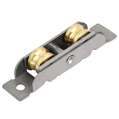 Heavy Duty Replacement Sliding Door Window Sash Pulley Wheels For Slick Slide Operation Dual Roller Setup Cuts Down On Dragging Frames Tough Brass And Stainless Steel Housing Comes In A 4 Piece Set, close-up view of dual brass wheels and stainless steel frame.
